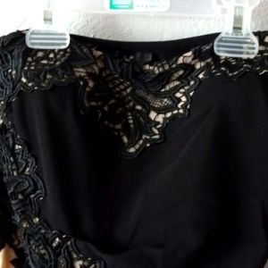 Black strapless dress.